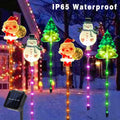 Piquets solaires lumineux Père Noël, sapin et renne – Santa's Gallery